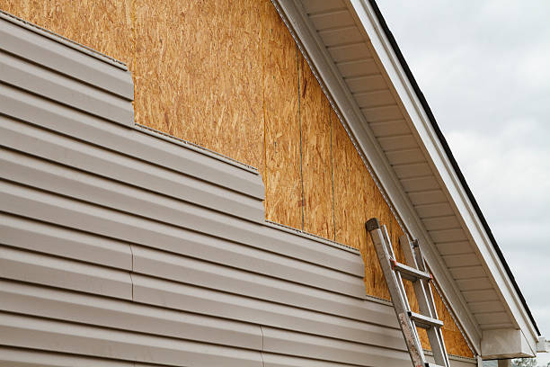 Professional Siding technician working in Summerhill, PA